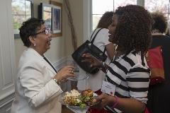 Two black women talking