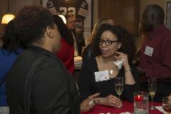 Room full of black professionals celebrating