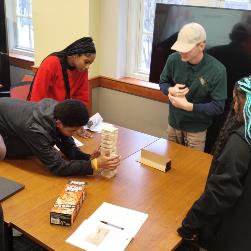 Image of Students at ShareIT playing jenga 3