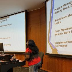 Mentor Anisa discusses slide about project management