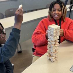 Student Group2 participate in Jenga project management activity