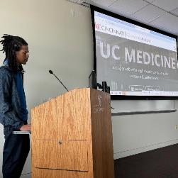 Jermaine demonstrates current project for UC College of Medicine